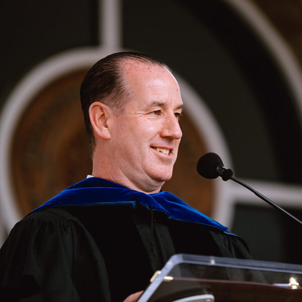 Jon-Paul Venoit delivers his Commencement keynote address from the podium
