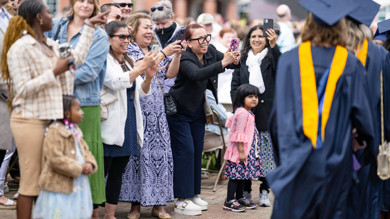 Families, friends, and loved ones celebrate their graduates success.