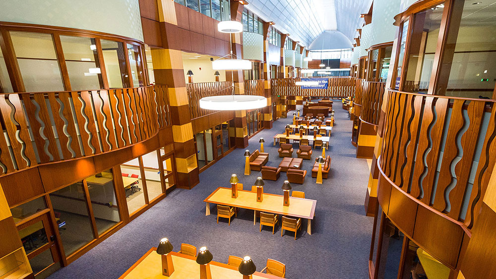 High angled shot of the law library showing desks, laps, and rows of books