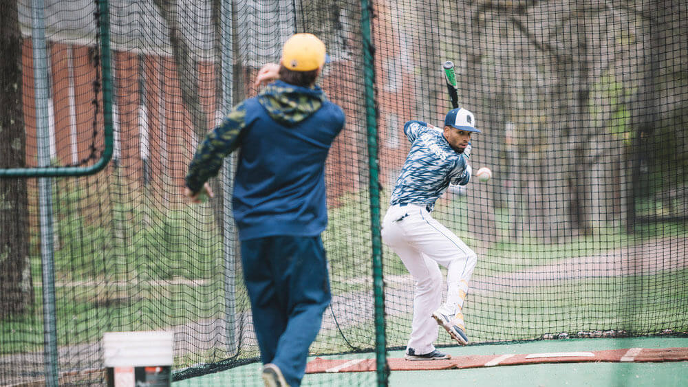 Practice makes perfect as a student-athlete takes a few swings on the Quinnipiac Baseball Field on the Mount Carmel Campus.
