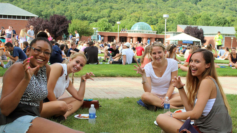 Students enjoy a  barbecue on the Mt Carmel campus.