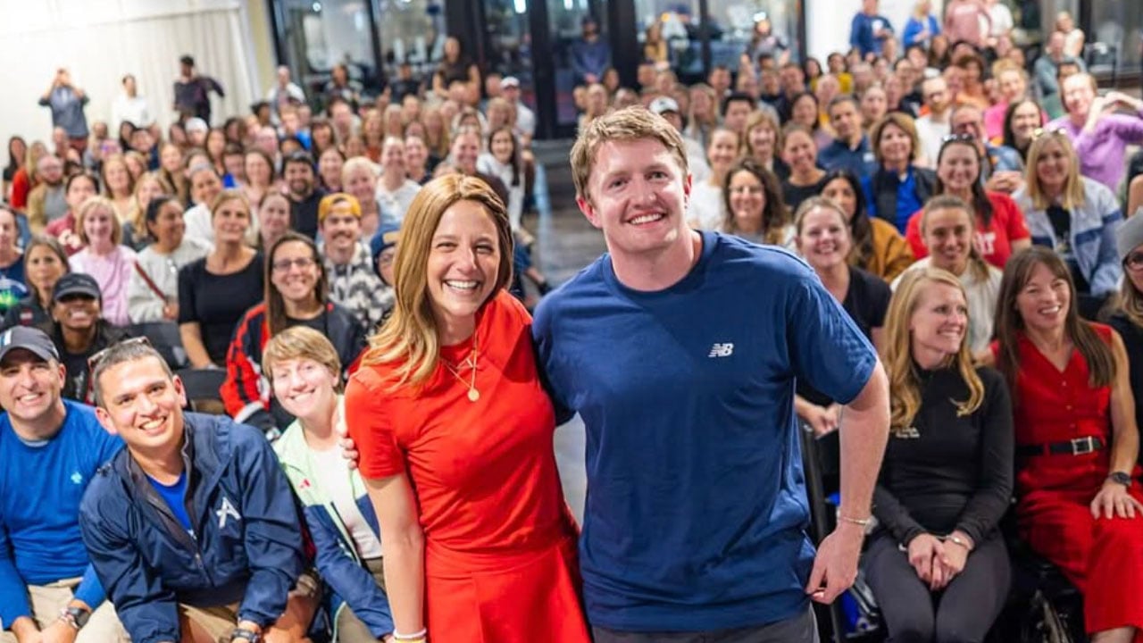 Alison Feller smiles with Eric Jenkins