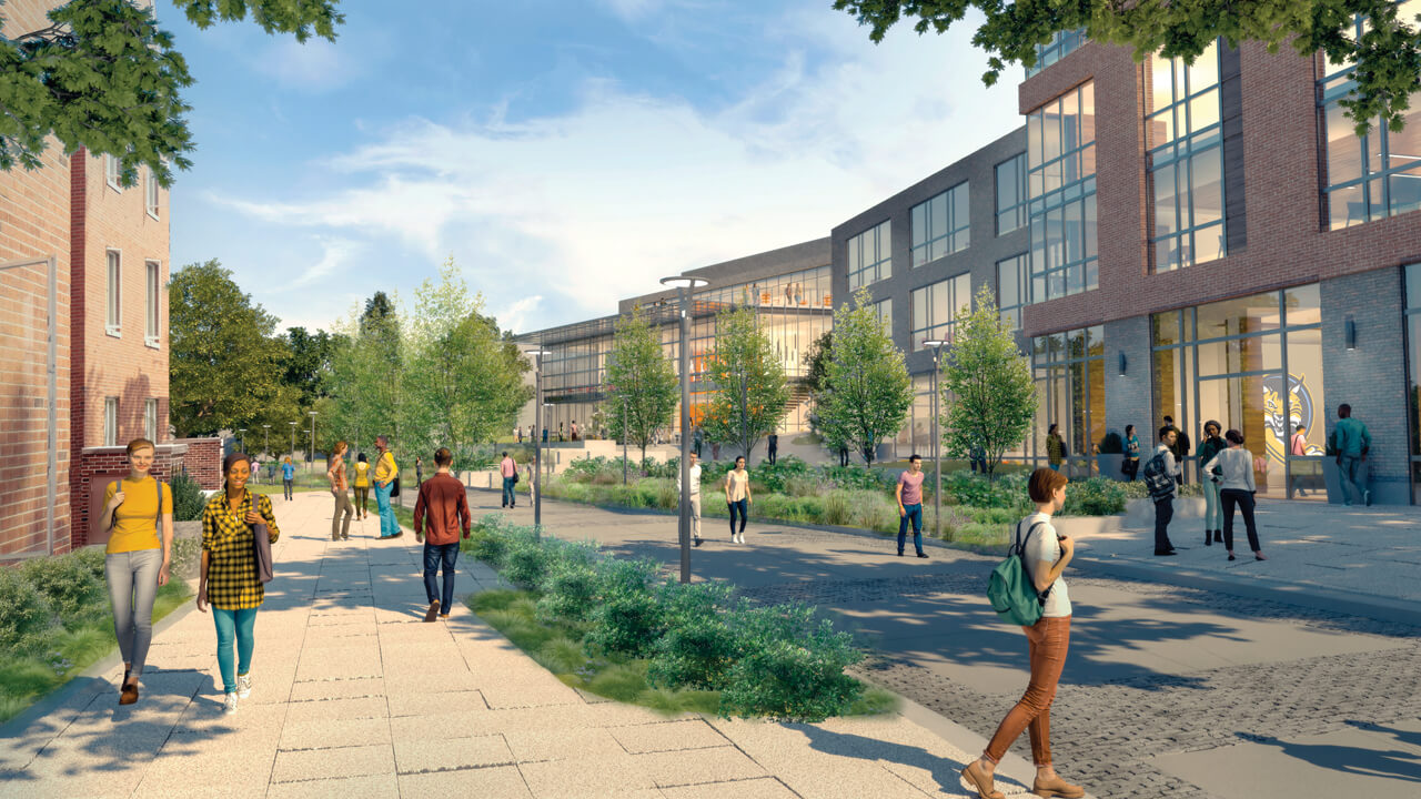 Many students walk along a reimagined Bobcat Way with new, vibrant buildings.