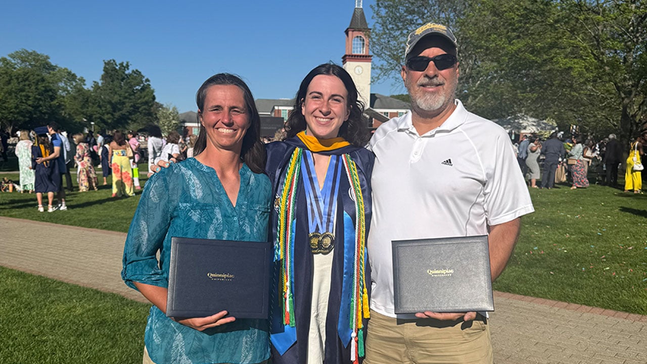 Jackie Grisdale and her parents at commencement