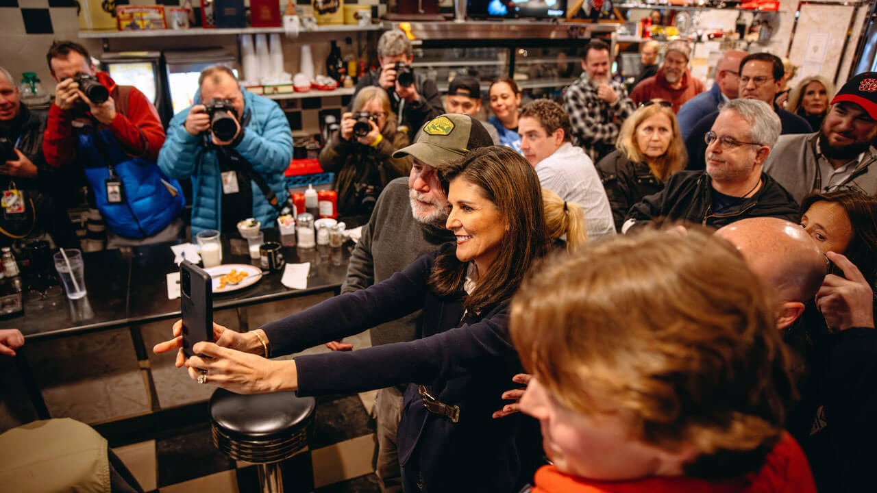 Nikki Haley taking photos with people of New Hampshire