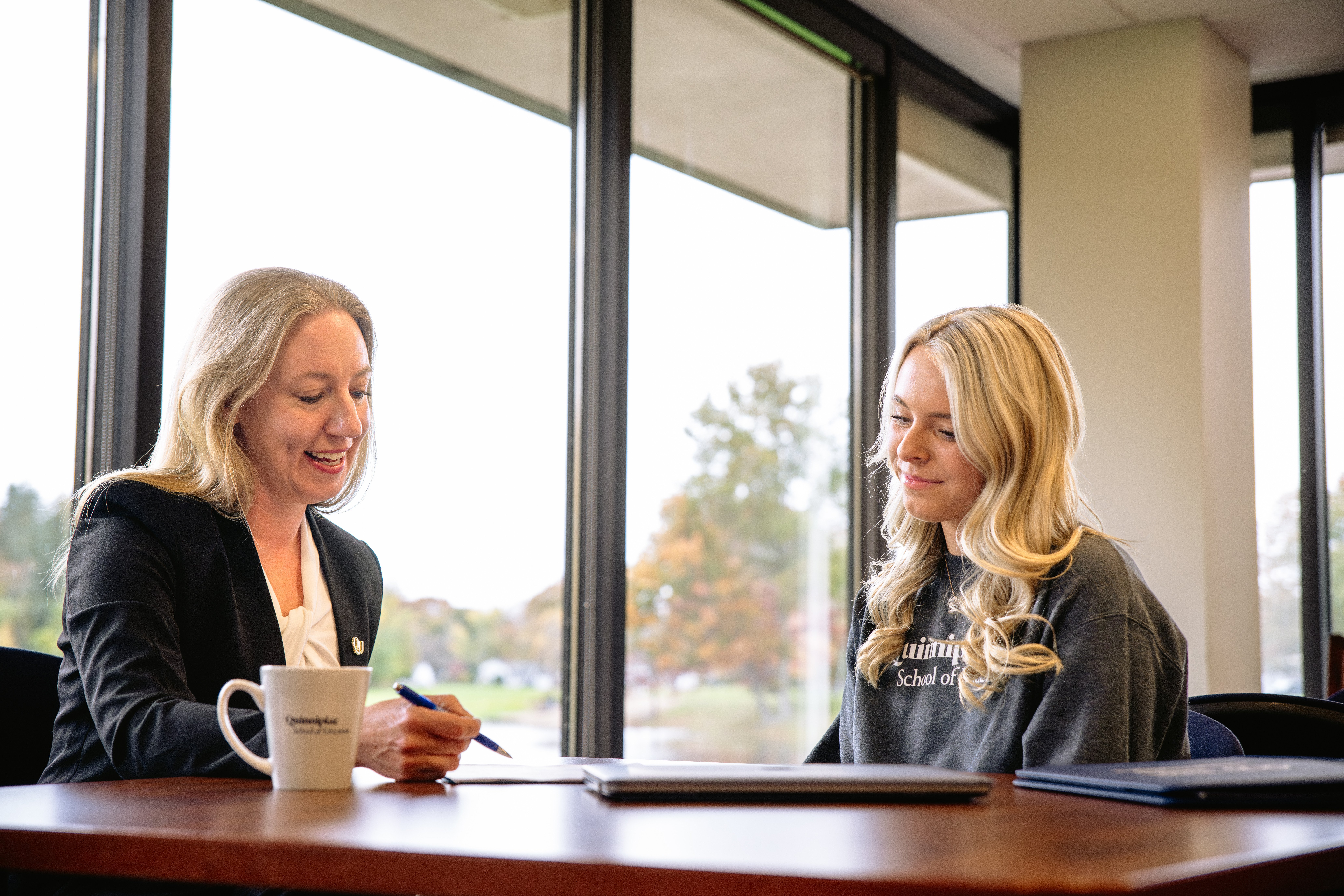 Student seeks guidance from staff