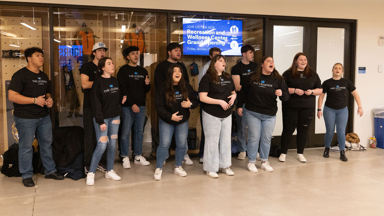 Legends Acapella perform at the rec and wellness center opening