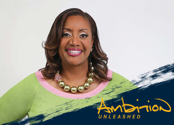 Ambition Unleashed: Elicia Spearman smiles broadly after winning an influential lawyer award