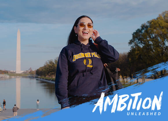 Ambition Unleashed: Ambar Pagan in front of the reflecting pool and Washington Monument