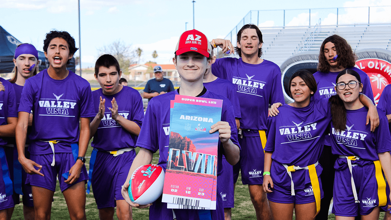 Vista Valley High School students posing for a photo at the Special Olympics Unified Sports Football Game.