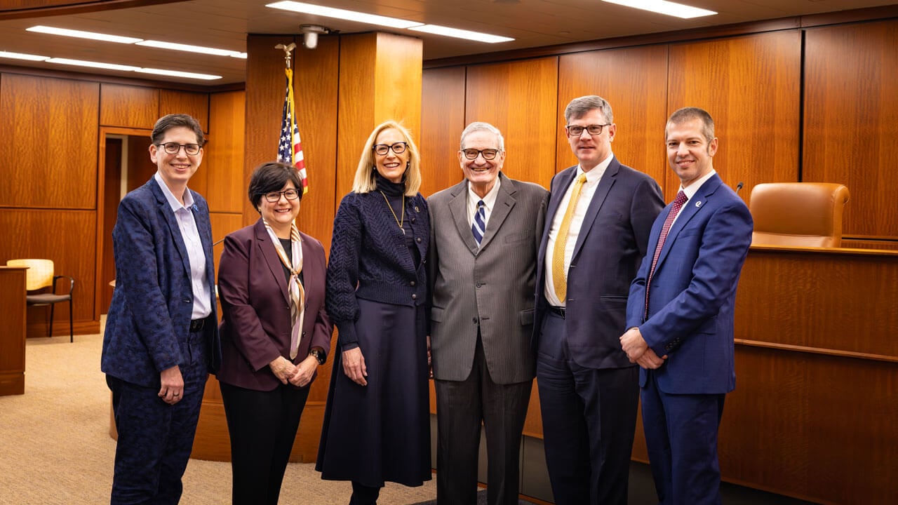 President Marie Hardin smiles with Provost and others