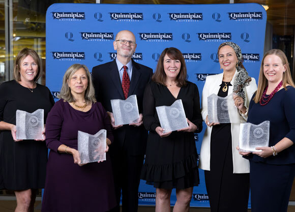 Quinnipiac Center for Excellence honorees pose with their awards