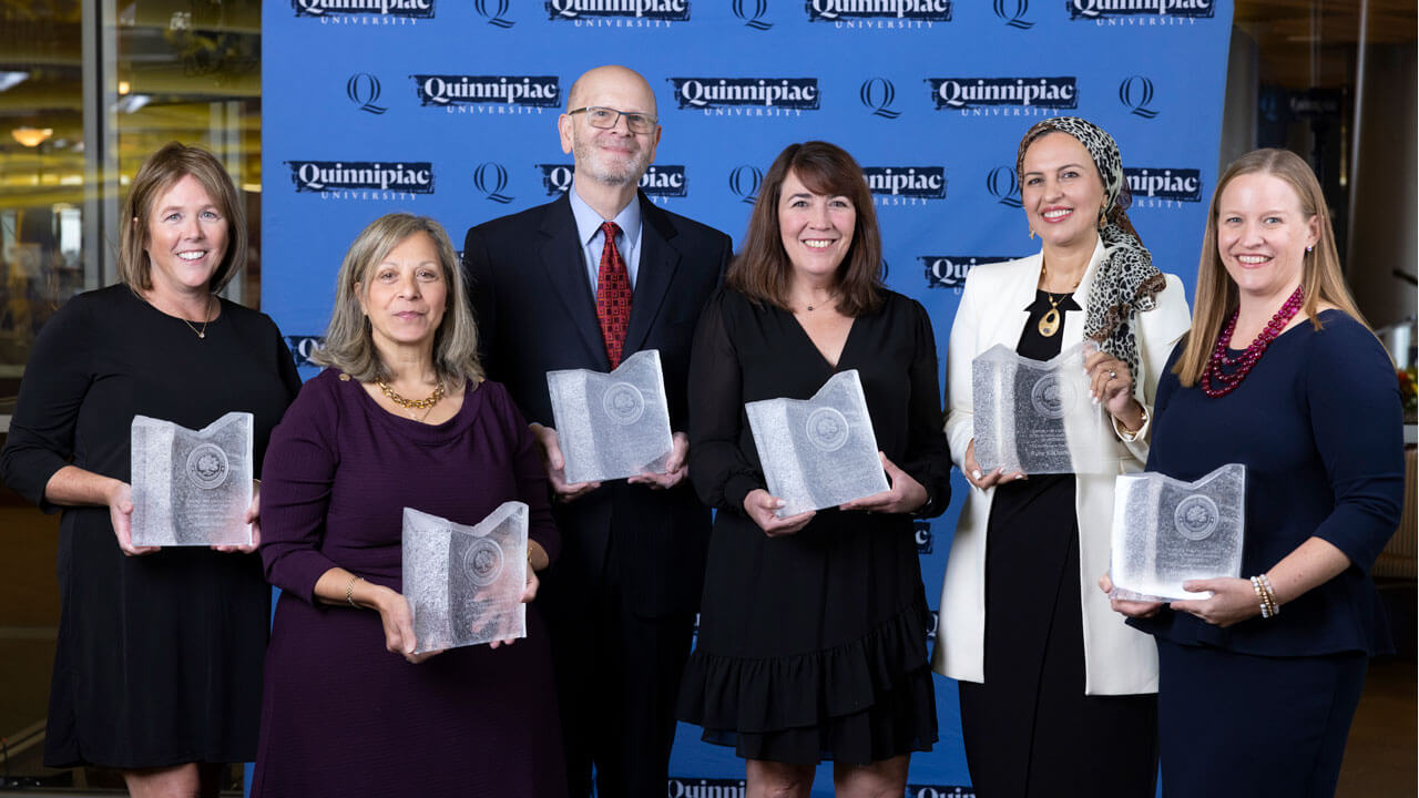 Quinnipiac Center for Excellence honorees pose with their awards