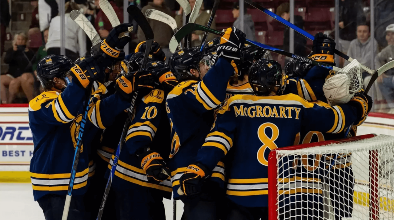 Quinnipiac men's ice hockey celebrates a win