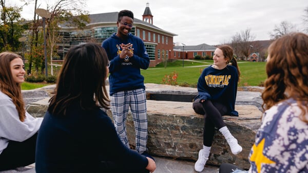 Students outside on the Mount Carmel campus.