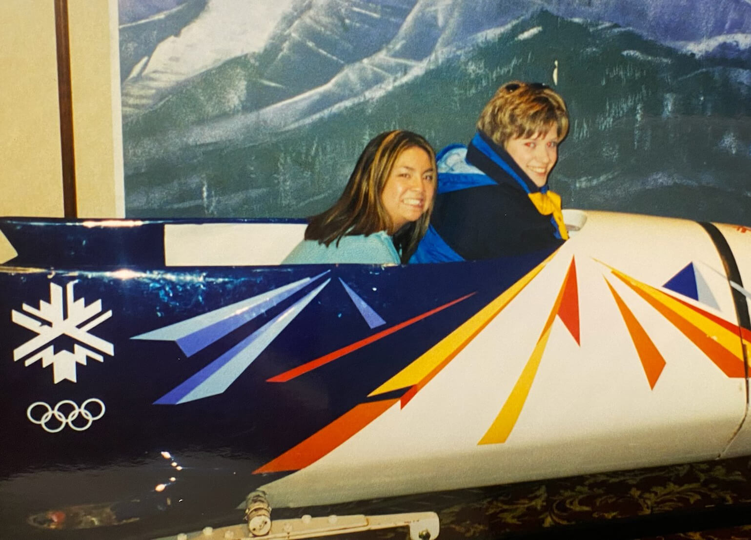 Andrea Luoma sits in a bobsled.