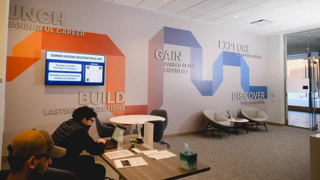 Students sitting in the Advising Suite