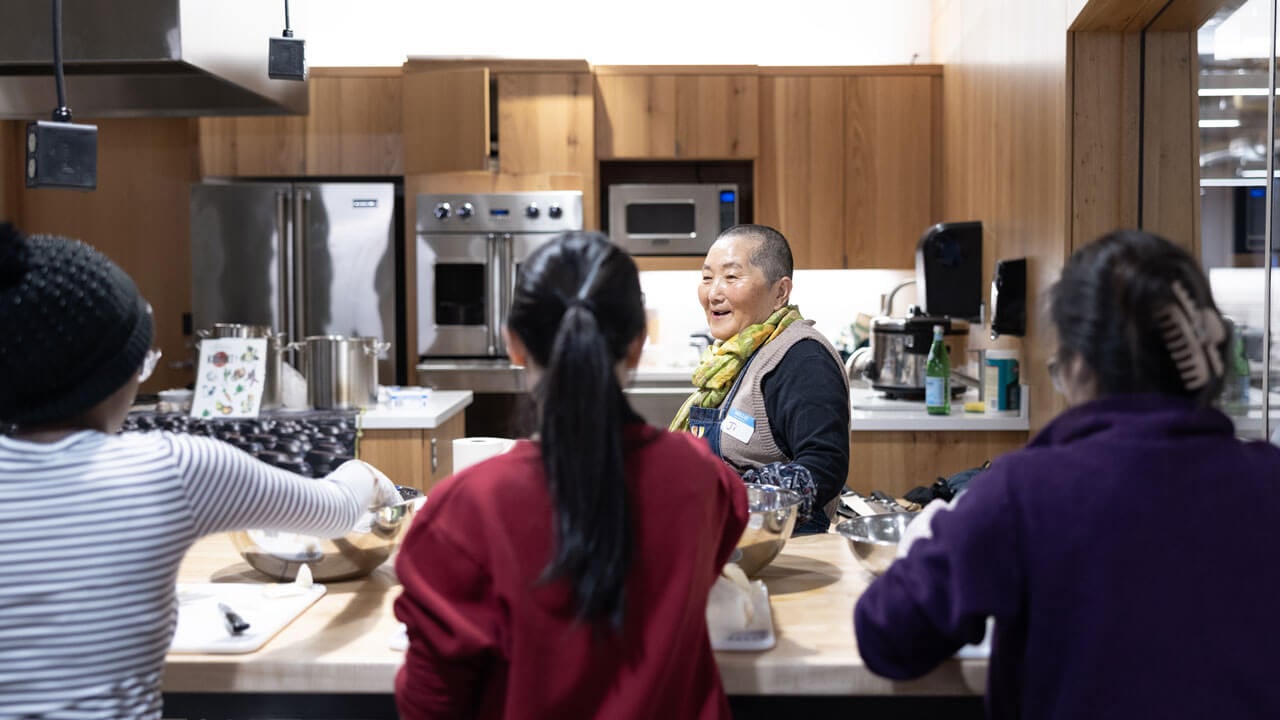 Students prepare kimchi in the RecWell kitchen