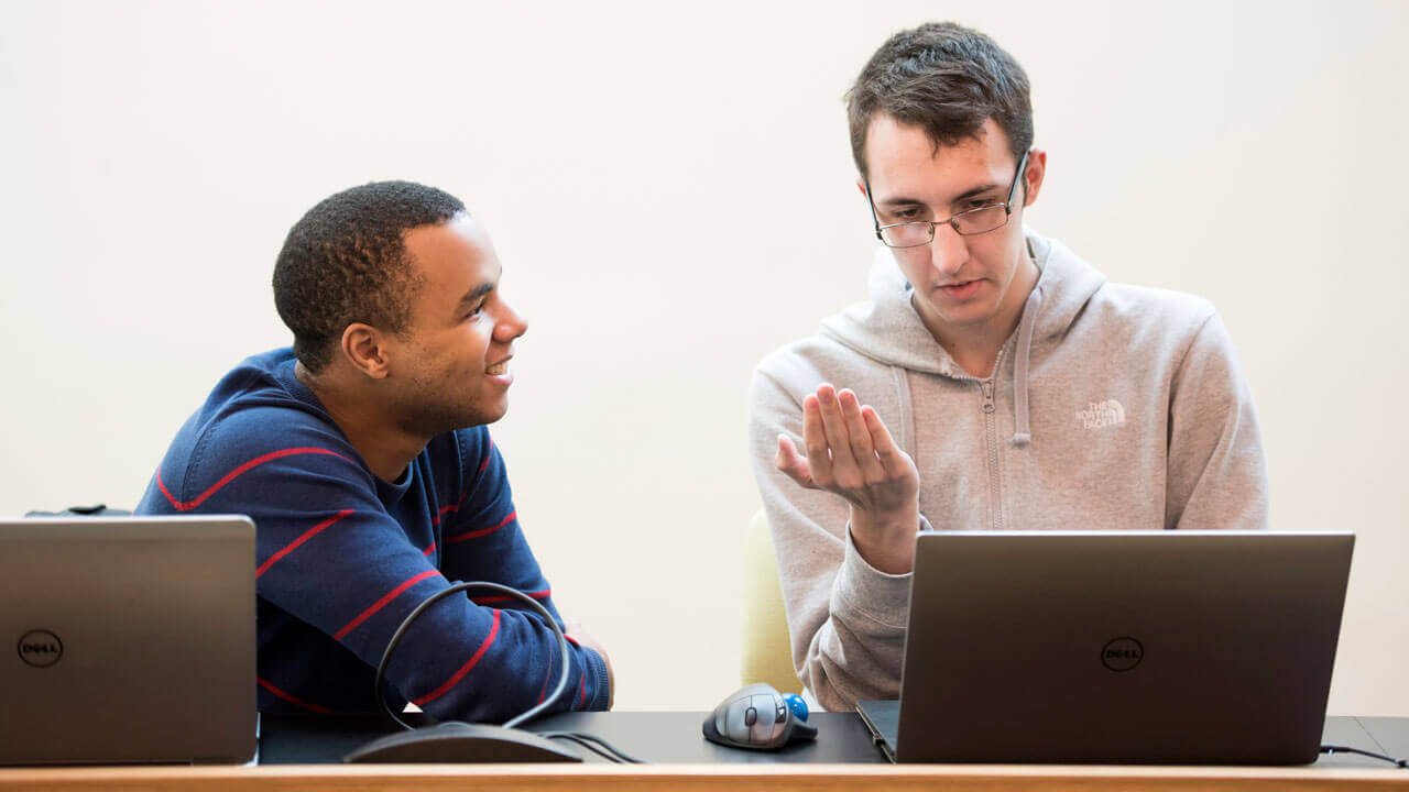 Quinnipiac engineering students Alex Baez, a senior, computer science major, and Tyler Dresselhouse, a senior, software engineering major, compete in the bi-annual hackathon Saturday, Nov. 5, 2016 in the Center for Communications and Engineering at Quinnipiac University in Hamden, Connecticut.