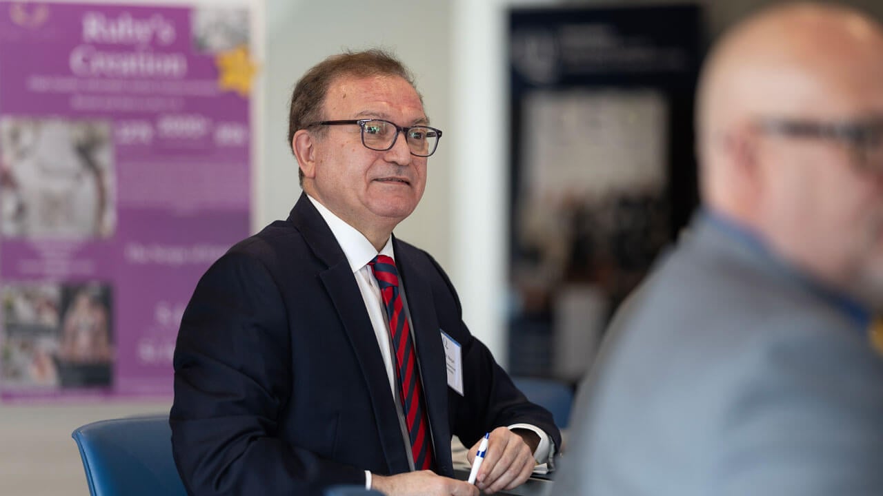 Deans gather in the School of Business