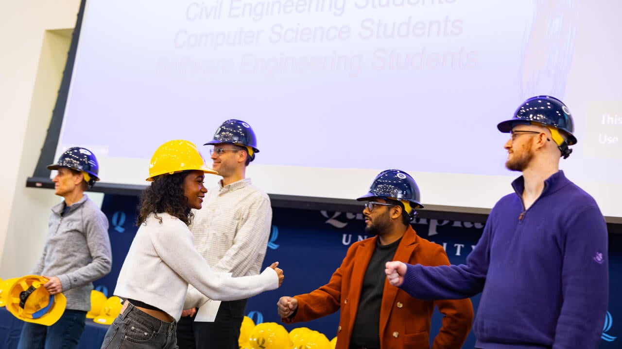 Professors give students hard hats