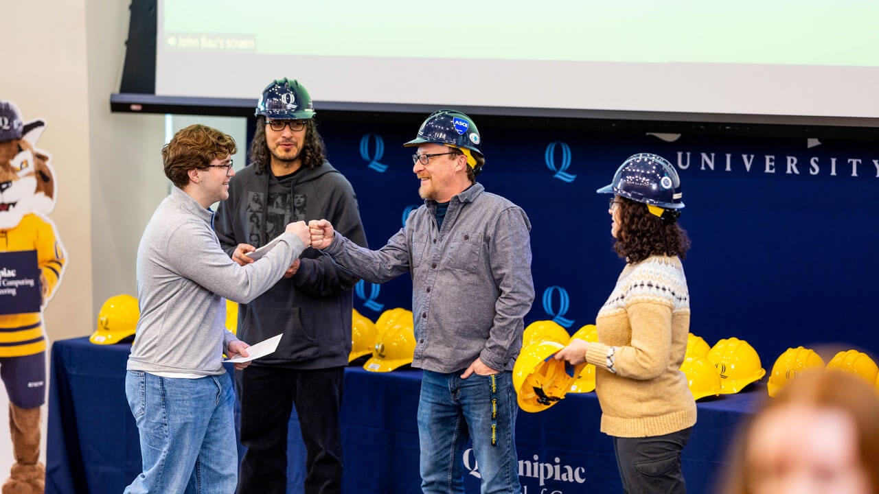 Professor gives students hard hats