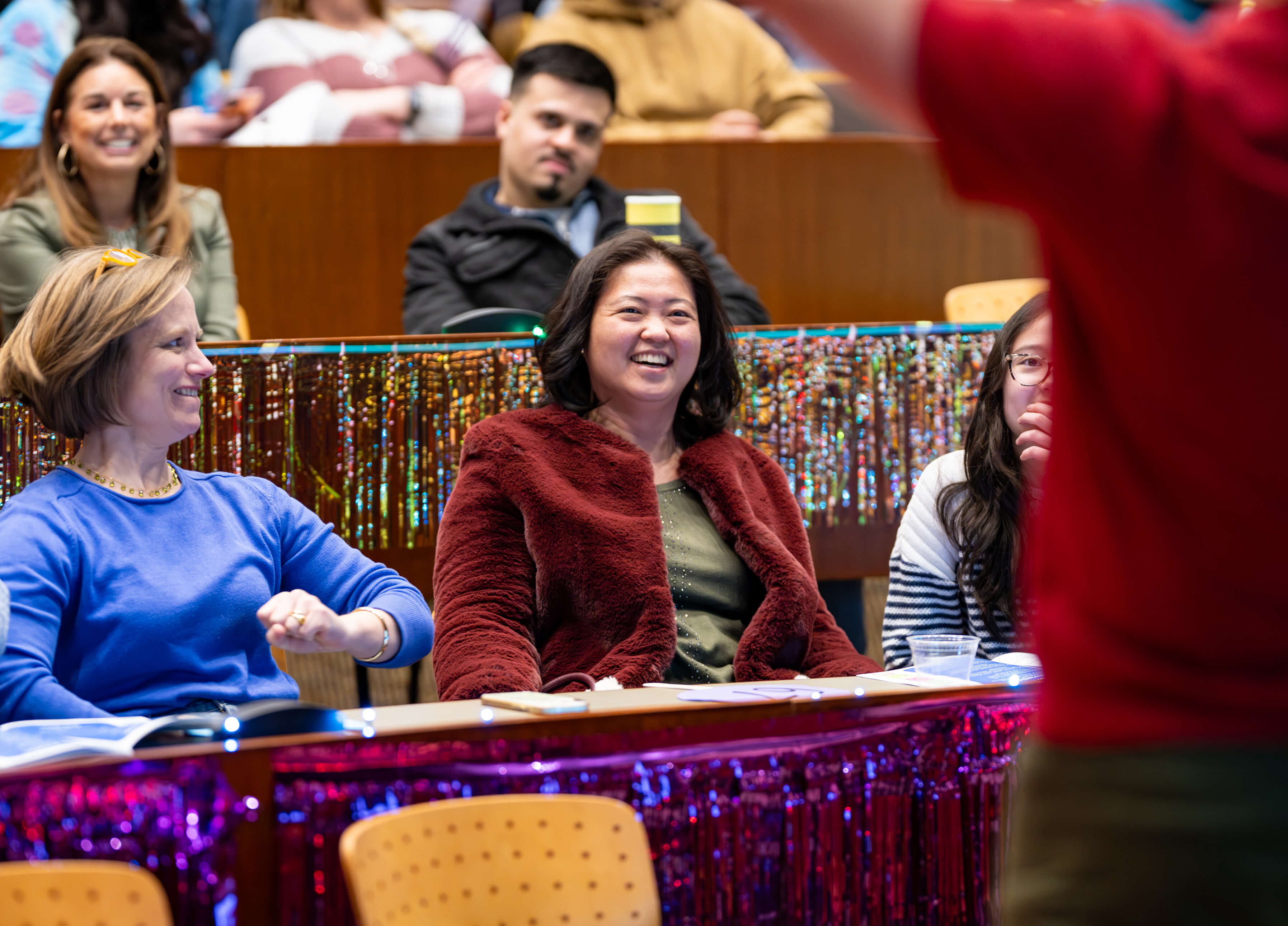 Audience member at the PILP Auction