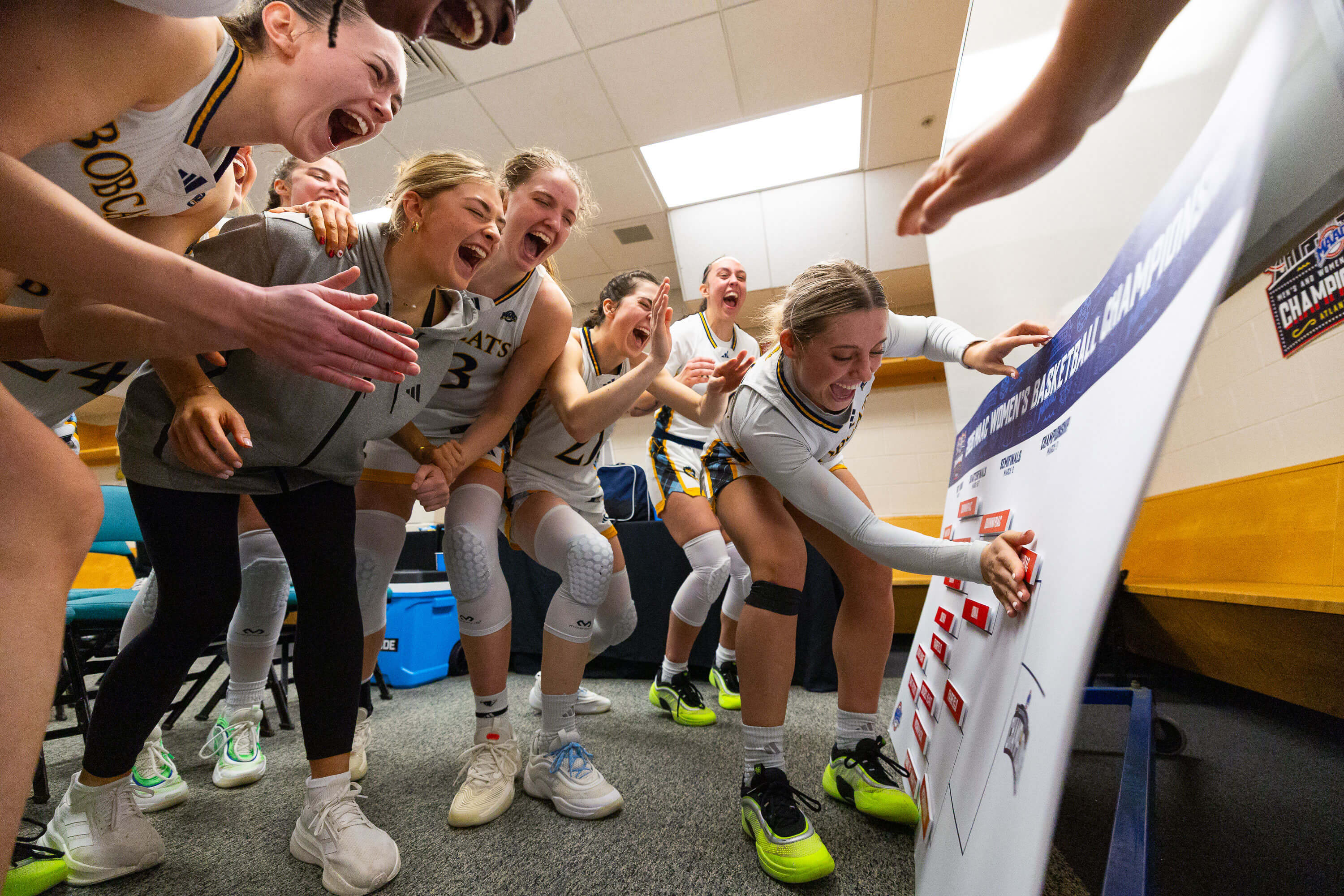 Quinnipiac women's basketball celebrates a win in the postseason.