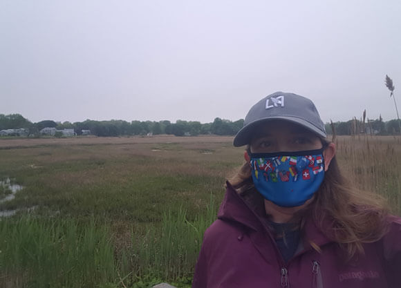 Hillary Haldane wearing mask at field