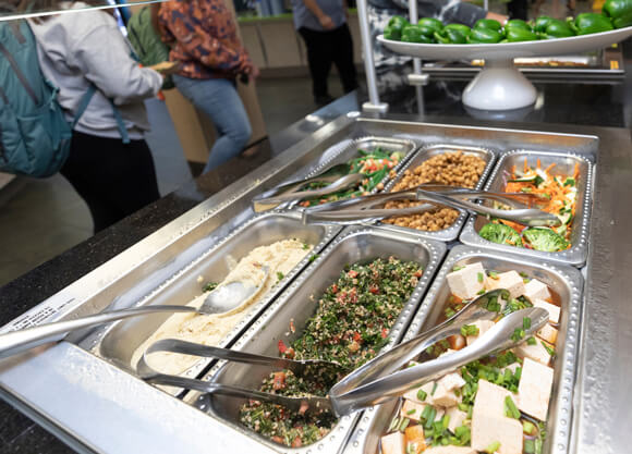 A food station in the Quinnipiac dining hall with vegan food options
