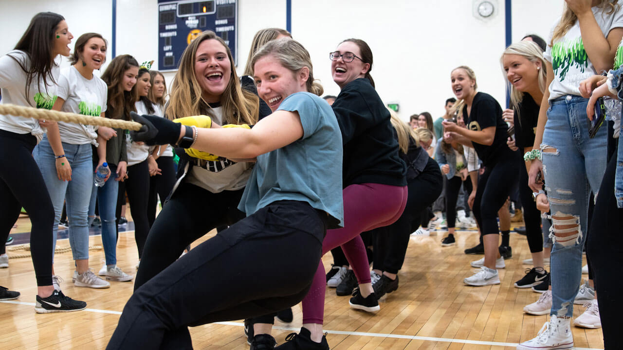 Students participating in a tug of war challenge during the sorority Kappa Delta's annual fundraising event, Shamrock The Rope Competition, for Prevent Child Abuse America and local affiliate The Children’s Center of Hamden in Burt Kahn Court.