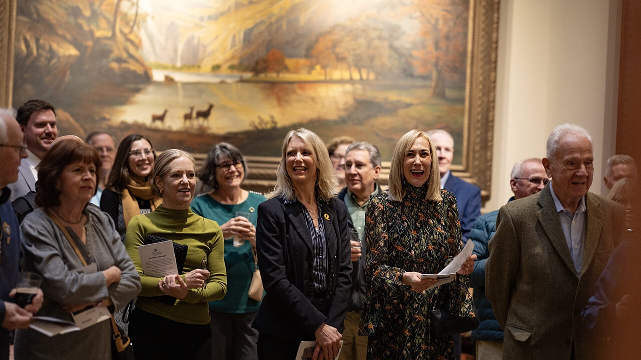 Community members gathered in for a photo in the Ireland Great Hunger Museum