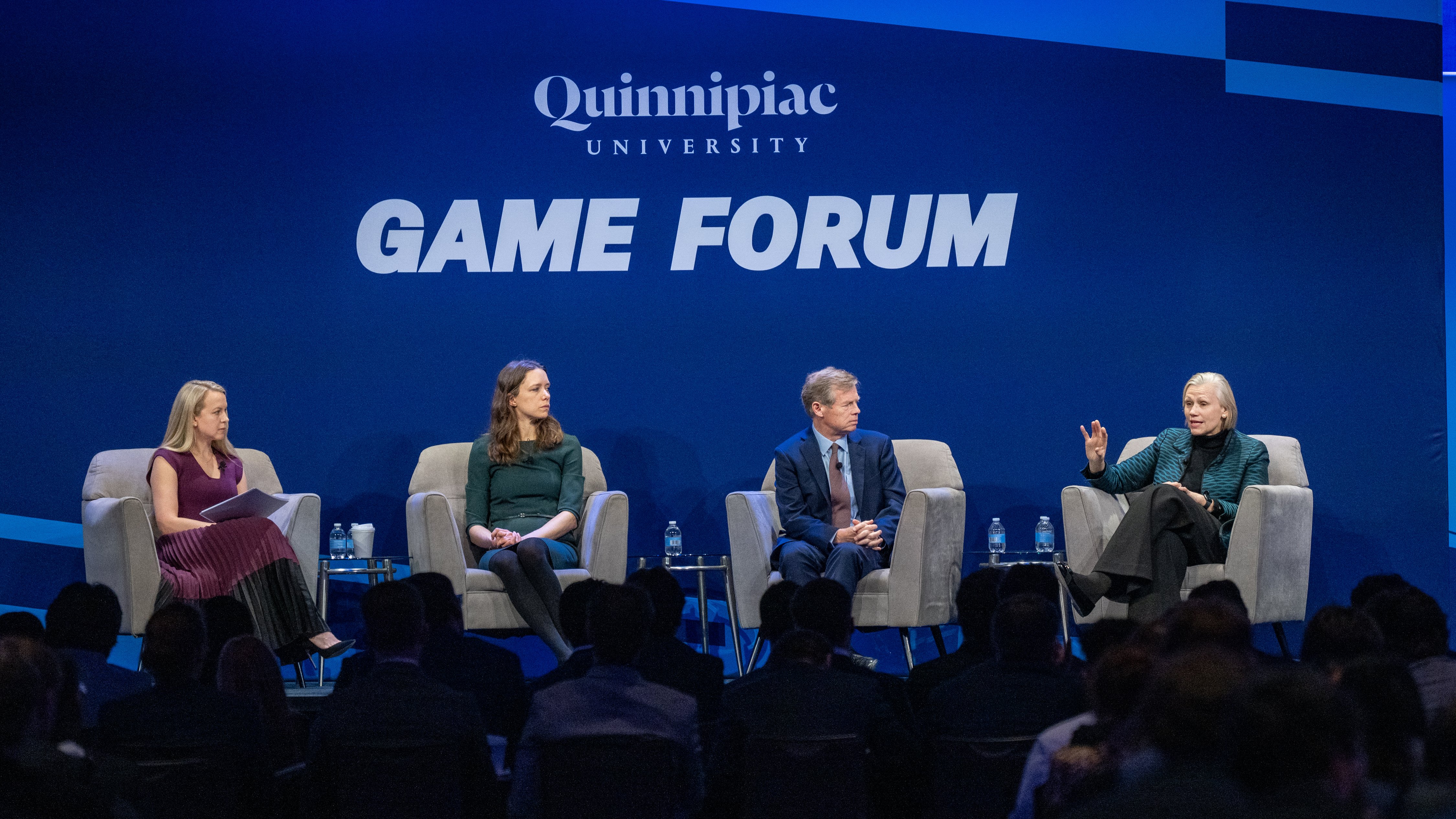 Seated panel at 15th annual Global Asset Management Education Forum in New York