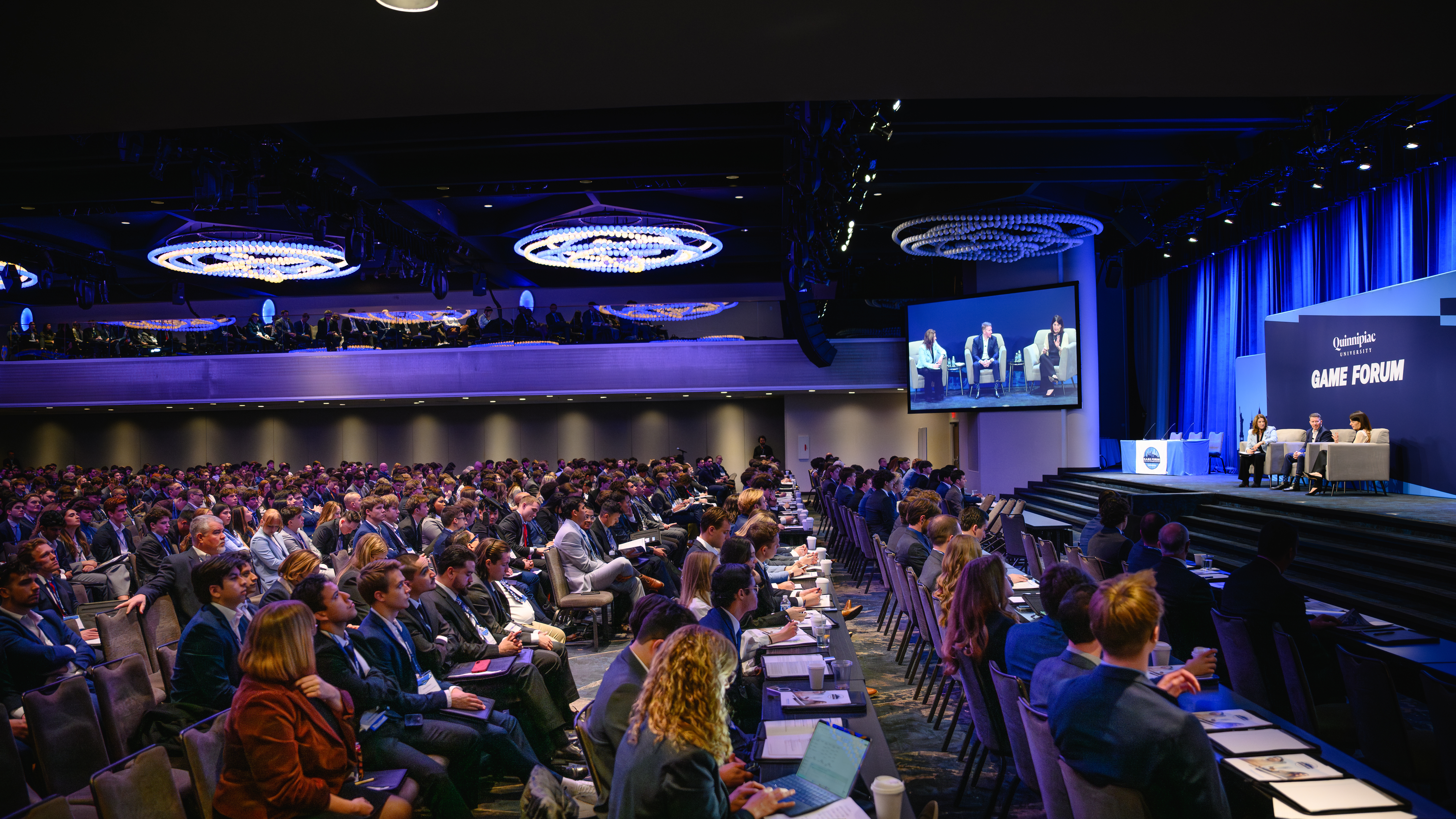 Side image of crowd at 15th annual GAME Forum in New York