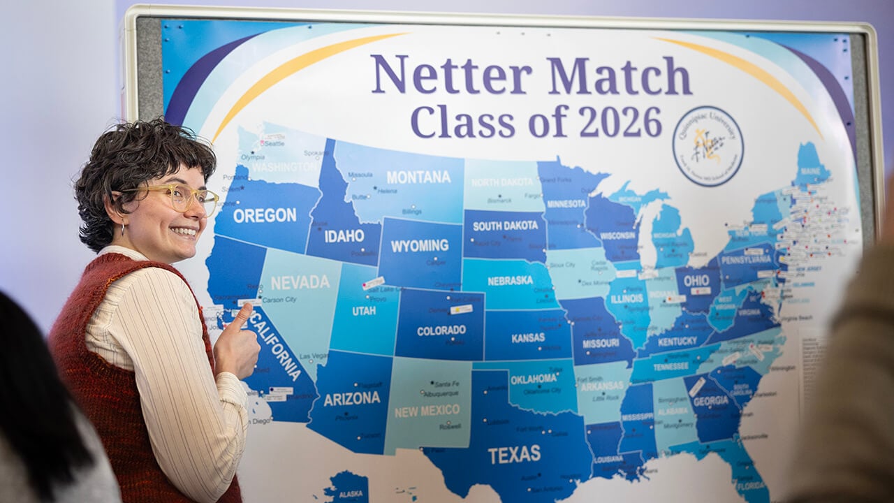 Student pointing to the map on Match Day 2026