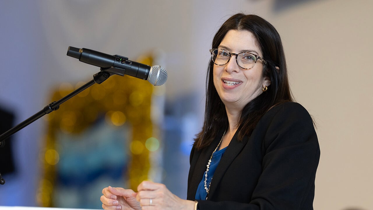 School of Medicine Dean speaking to students on Match Day before they open their Matches