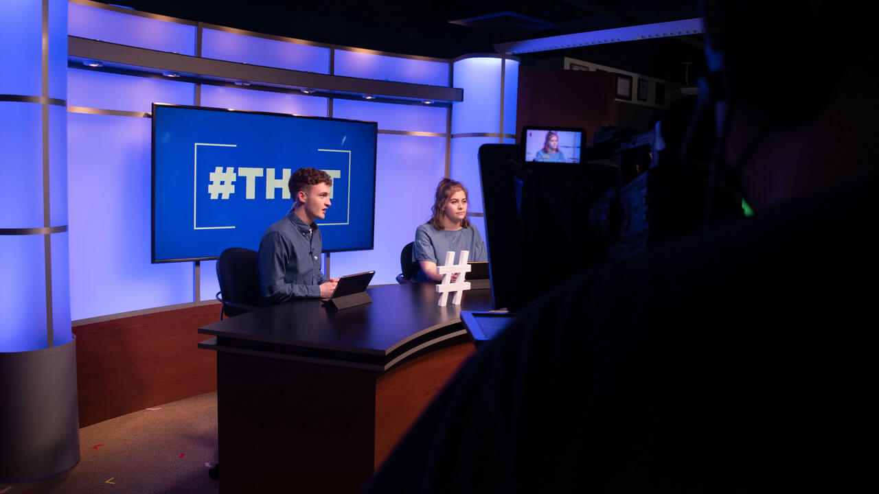 Joe and Abby anchoring hashtag that for q30tv in the brand new studio