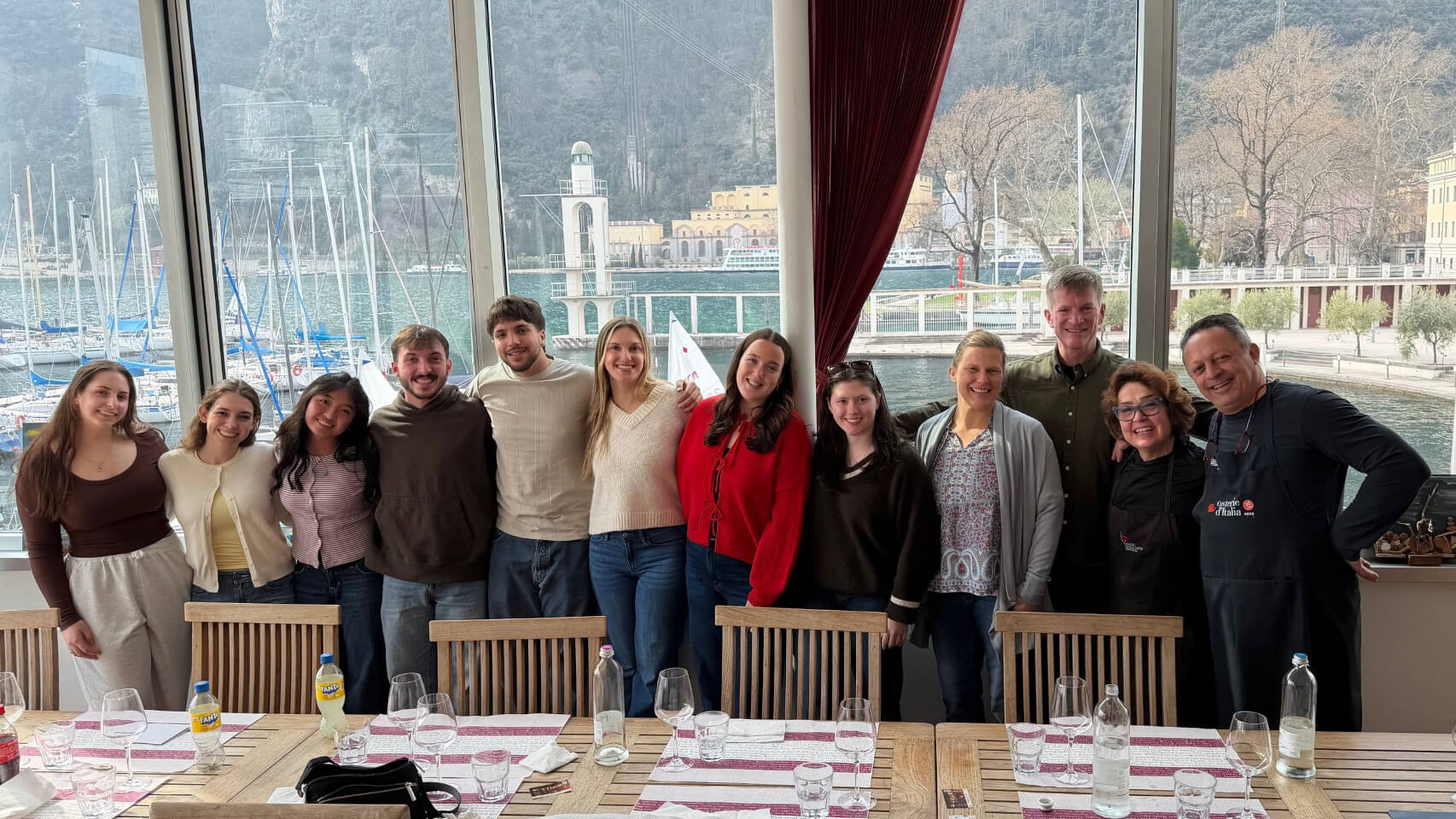 Nursing students pose for a photo after cooking together