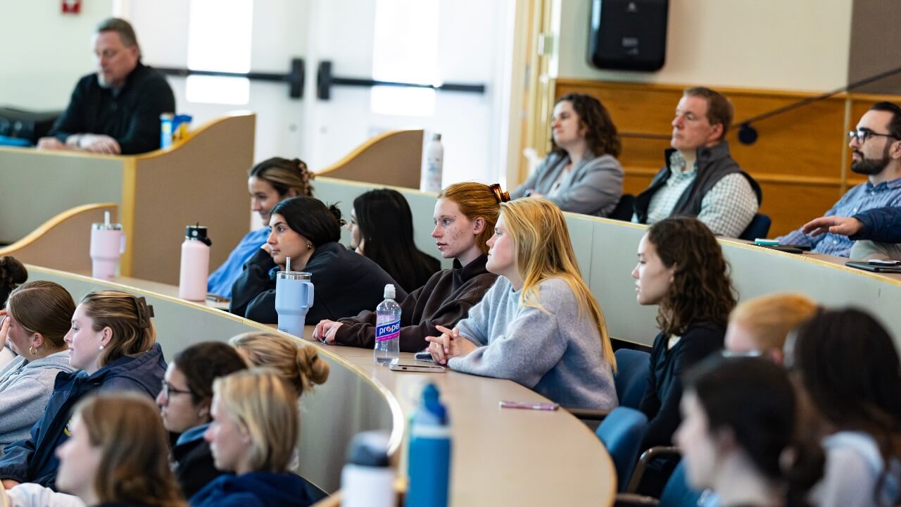 Students listening to Robert Fitzpatrick speaking