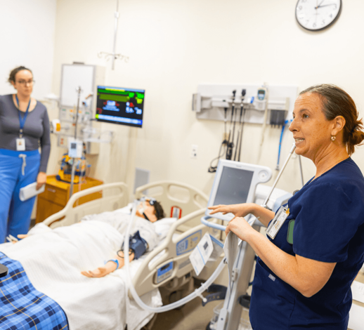 instructor leading students in simulation lab