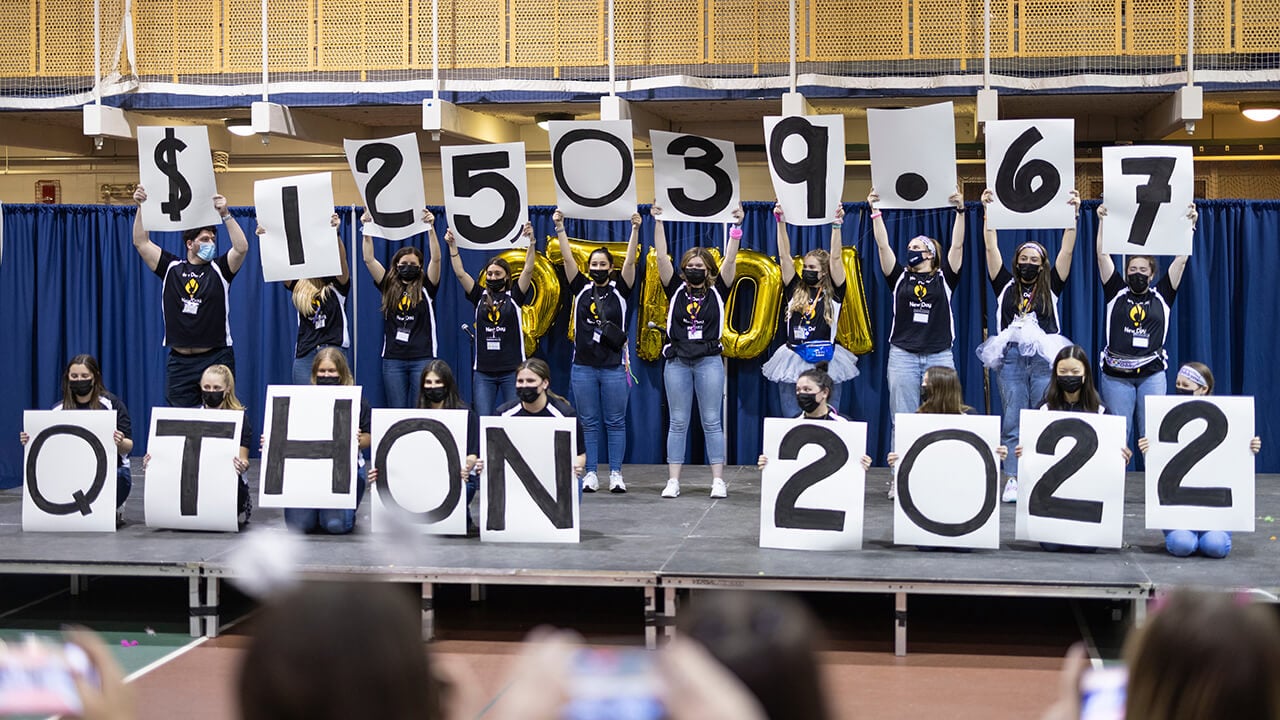 Students reveal the $125,039.67 raised.