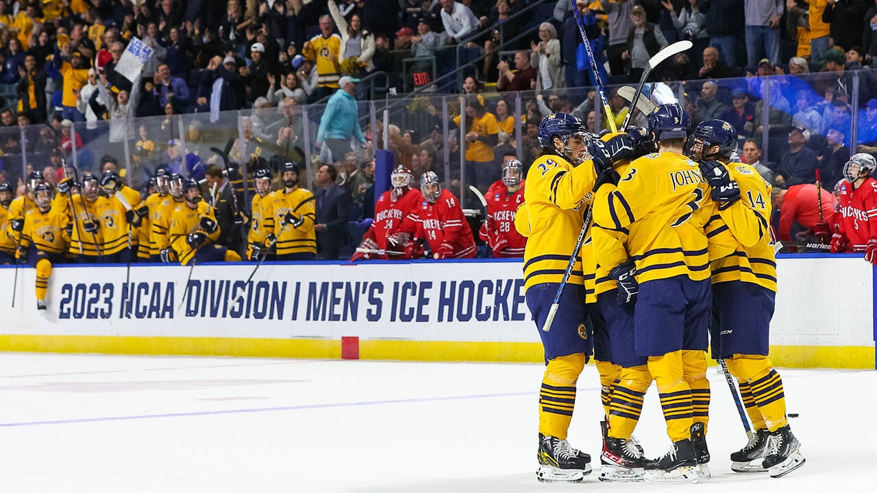 The Quinnipiac men's ice hockey team celebrates advancing to the Frozen Four