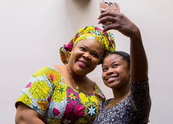 Leymah Gbowee, 2011 Nobel Laureate and Liberian peace activist, smiles for a selfie with Natesha Bestman DNP '17