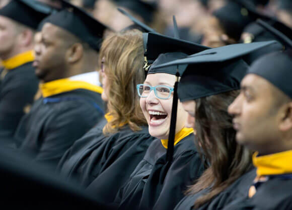 The university community conferred 985 graduate degrees on Saturday, May 13 in the College of Arts and Sciences, and Schools of Business, Communications, Education, Health Sciences and Nursing
