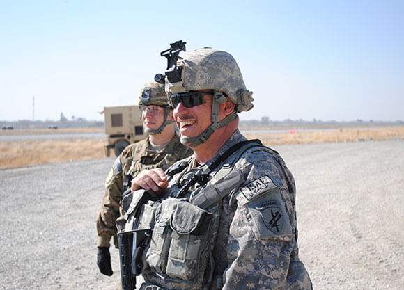 Shot of Thomas Kinton on the field during the Afghanistan refugee crisis