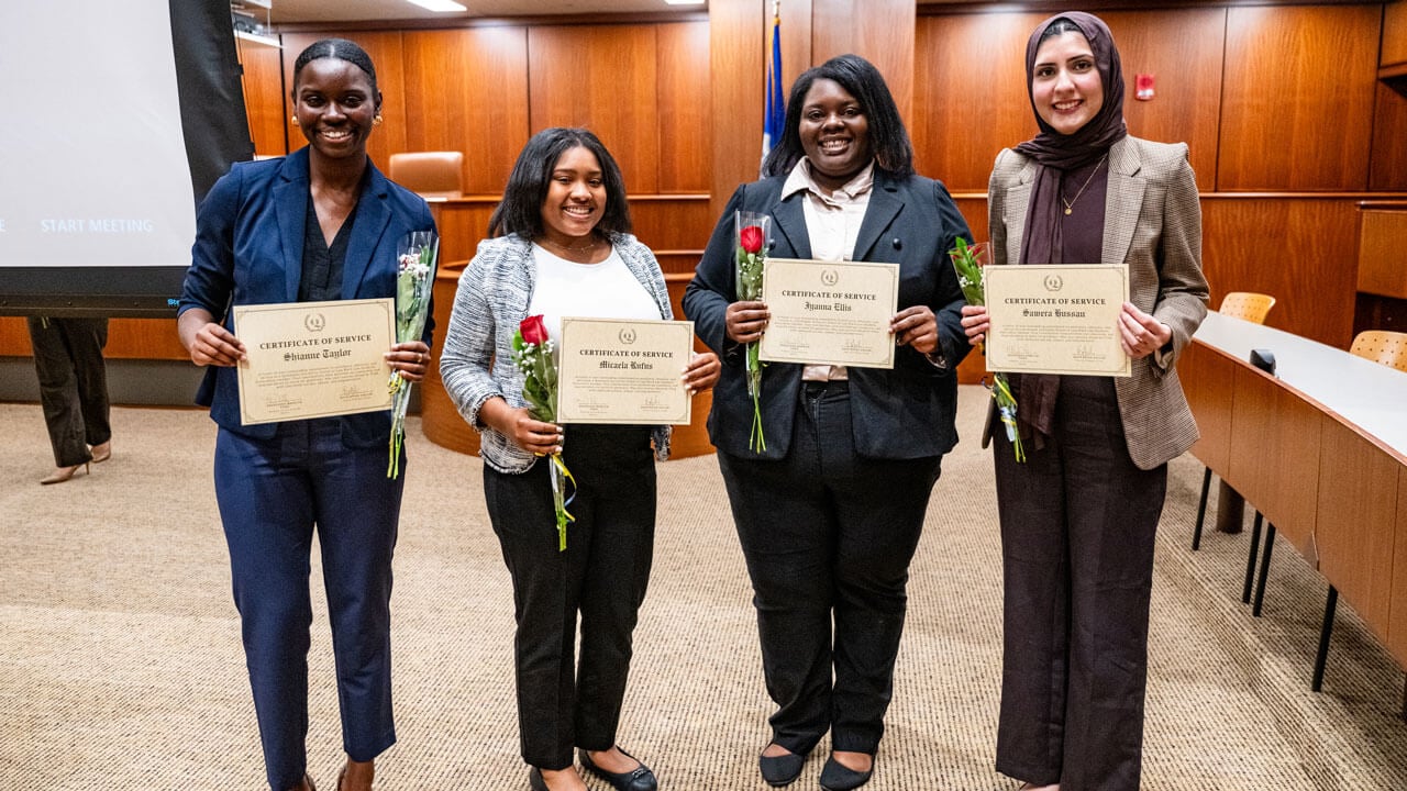 Honorees pose with their awards