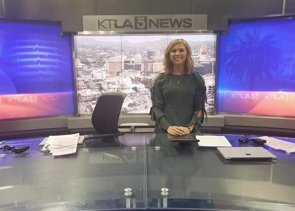 Meyer sits on the set of KTLA news