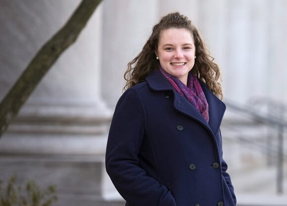 Amanda Smallhorn JD '18 stands in front of a courthouse in New Haven, Connecticut