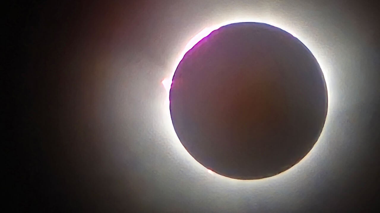 A close-up photo of the eclipse in the sky.