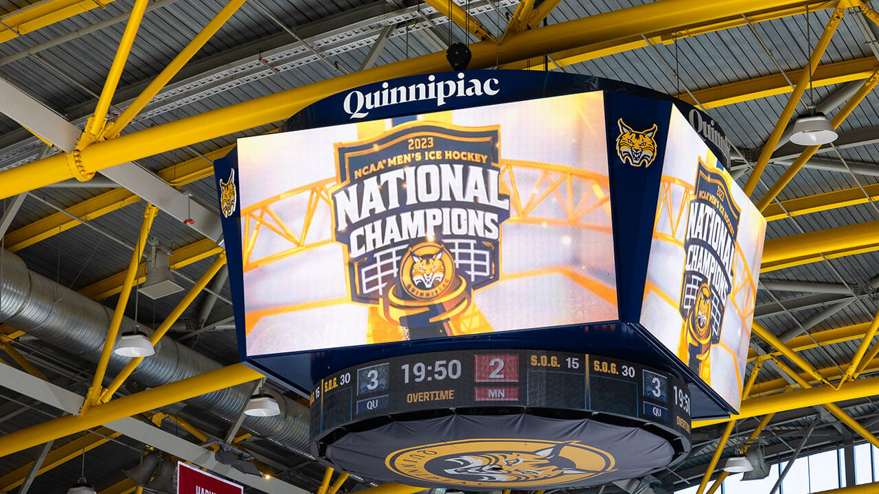 M&T Bank Arena jumbotron reading 2023 NCAA men's ice hockey national champions